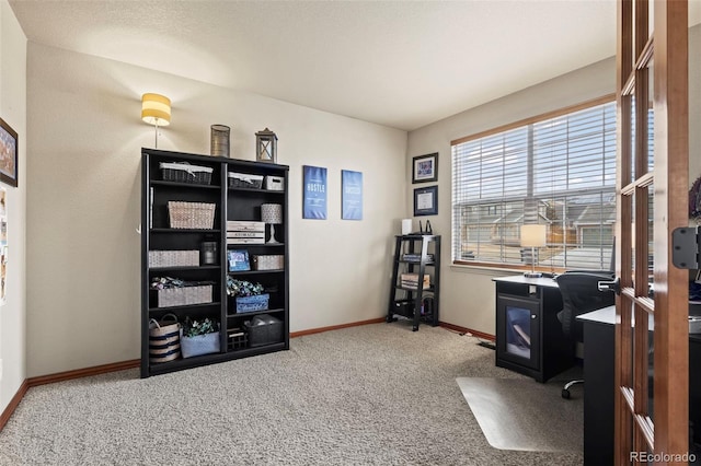 view of carpeted office space