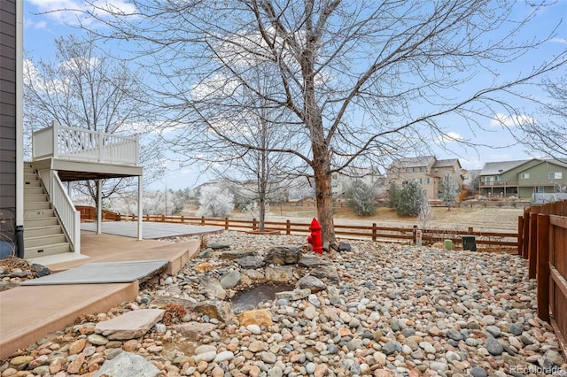 view of yard with a wooden deck