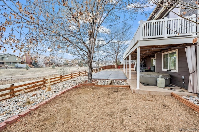 view of yard featuring a patio and a balcony