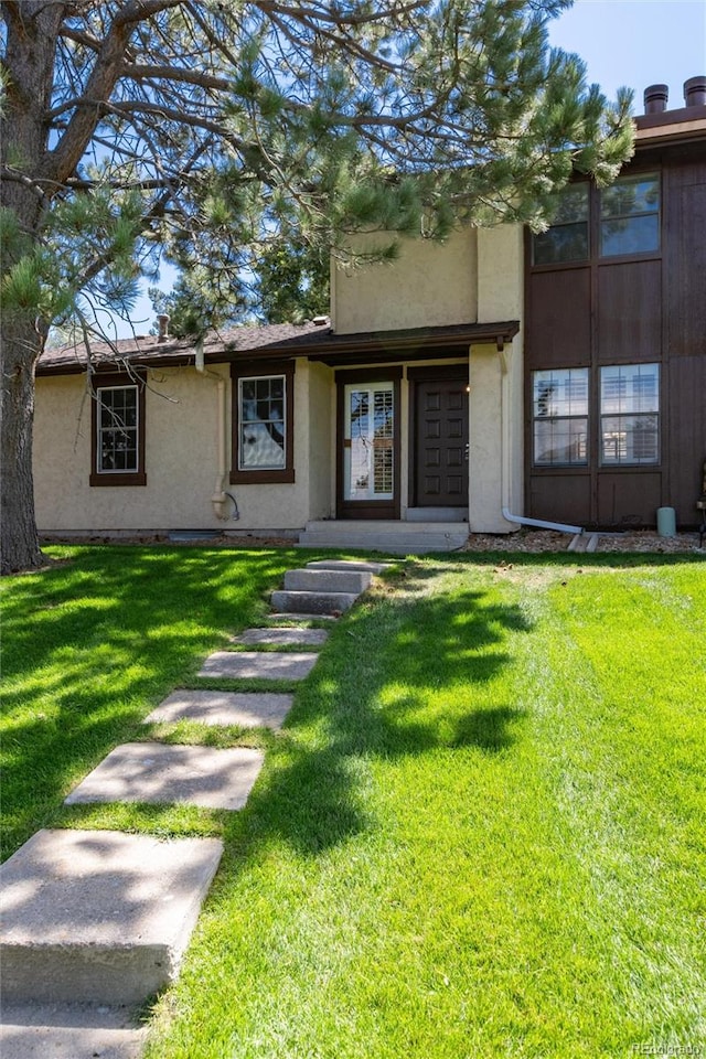 exterior space featuring a front lawn