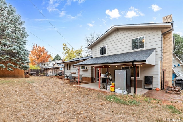 rear view of house with a patio area