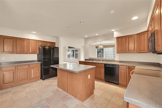 4042 E Hinsdale Cir, Centennial, CO 80122 - kitchen featuring freestanding refrigerator, dishwashing machine, a kitchen island, a sink, and recessed lighting