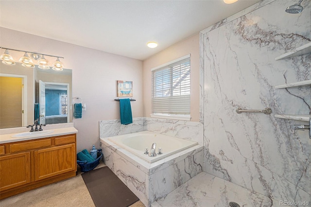 5224 Snow Goose St, Brighton, CO 80601 - full bath featuring a garden tub, vanity, and a marble finish shower