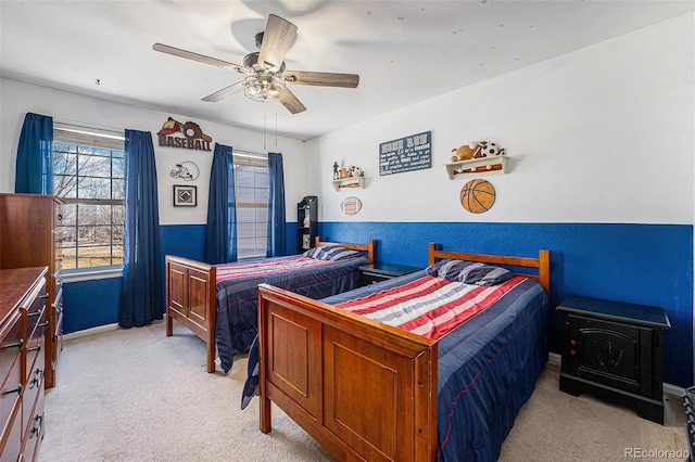 5224 Snow Goose St, Brighton, CO 80601 - bedroom with light carpet and a ceiling fan