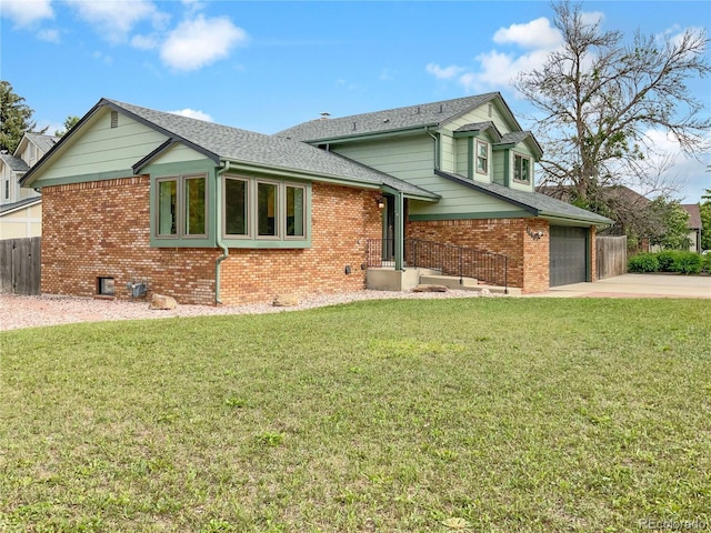 1460 Belmont Dr, Longmont, CO 80503 - view of front of house with driveway, brick siding, a garage, and a shingled roof