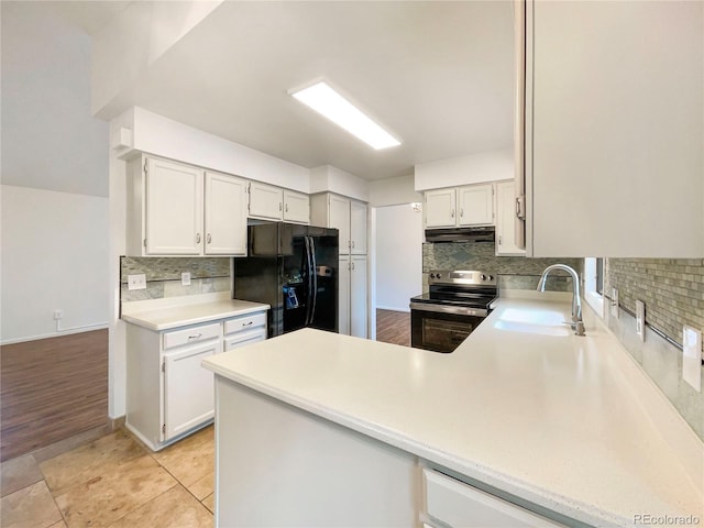 1460 Belmont Dr, Longmont, CO 80503 - kitchen featuring stainless steel range with electric stovetop, black refrigerator with ice dispenser, under cabinet range hood, tasteful backsplash, and light countertops