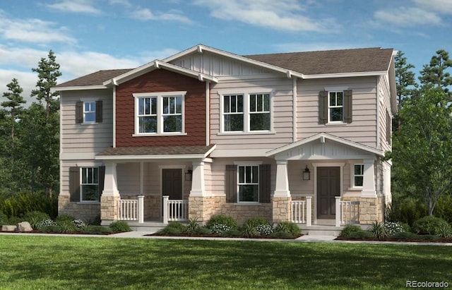 craftsman-style home with stone siding, roof with shingles, covered porch, board and batten siding, and a front yard