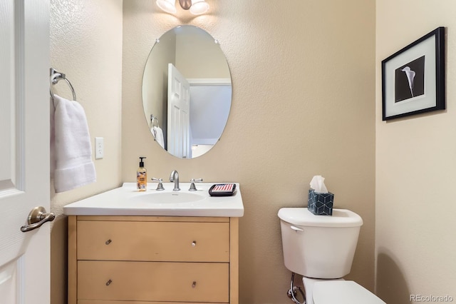 511 Noel Ave, Longmont, CO 80501 - half bath featuring vanity and toilet
