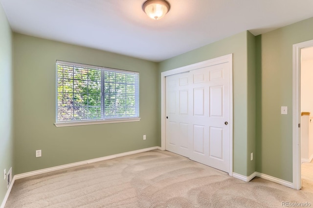 511 Noel Ave, Longmont, CO 80501 - unfurnished bedroom with carpet, a closet, and baseboards