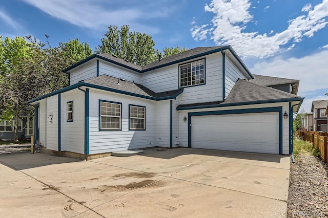 511 Noel Ave, Longmont, CO 80501 - traditional-style house featuring driveway and a shingled roof