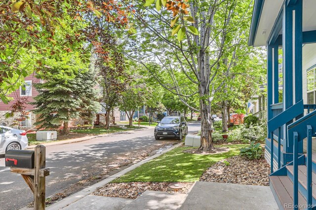 511 Noel Ave, Longmont, CO 80501 - view of asphalt road with sidewalks and curbs