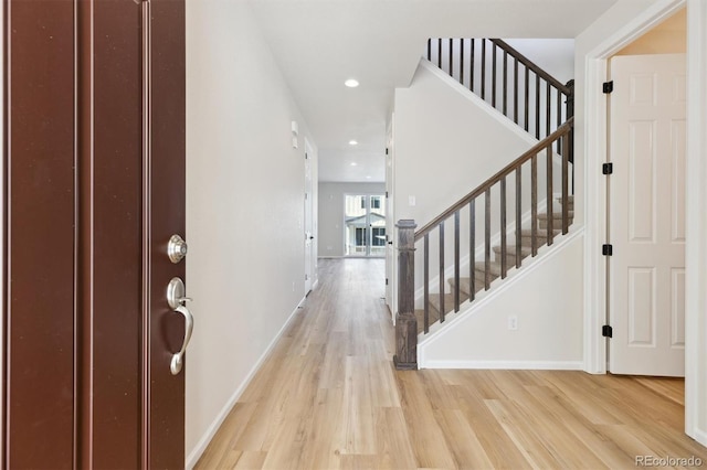 entrance foyer featuring light hardwood / wood-style floors