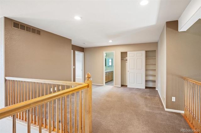 15577 Greenstone Cir, Parker, CO 80134 - hall featuring carpet, recessed lighting, and an upstairs landing