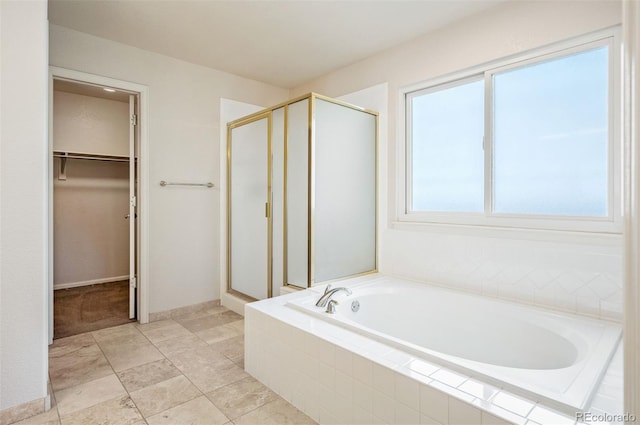 15577 Greenstone Cir, Parker, CO 80134 - full bath with a stall shower, a bath, and a spacious closet