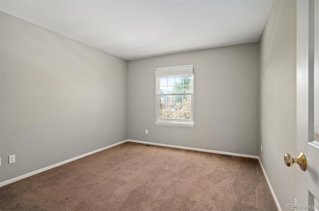 15577 Greenstone Cir, Parker, CO 80134 - spare room featuring carpet flooring and baseboards