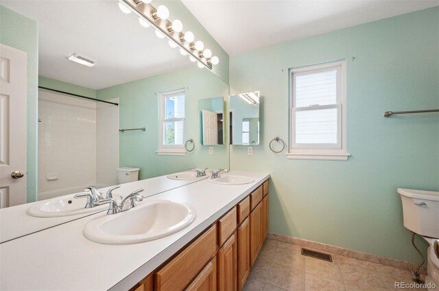 15577 Greenstone Cir, Parker, CO 80134 - full bathroom featuring double vanity, a shower, and tile patterned flooring