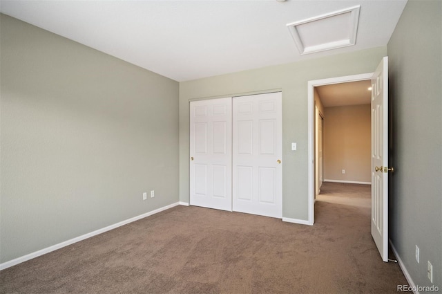 15577 Greenstone Cir, Parker, CO 80134 - unfurnished bedroom featuring attic access, carpet, and a closet