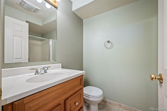 15577 Greenstone Cir, Parker, CO 80134 - full bathroom with vanity, tile patterned floors, a shower with door, and a textured wall