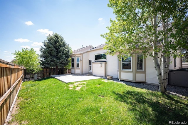 15577 Greenstone Cir, Parker, CO 80134 - fenced backyard with a patio area