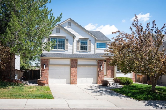 15577 Greenstone Cir, Parker, CO 80134 - view of front of property featuring an attached garage, concrete driveway, and brick siding