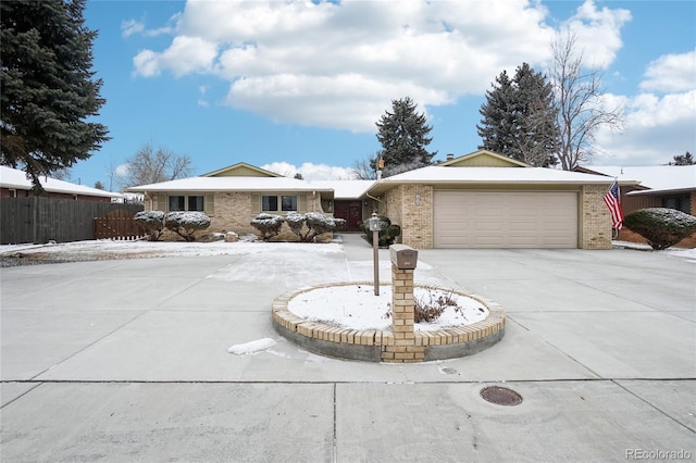 ranch-style home with a garage