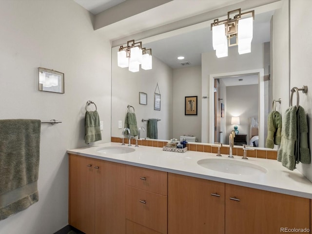 1880 W 32nd Ave, Denver, CO 80211 - bathroom featuring double vanity and ensuite bath