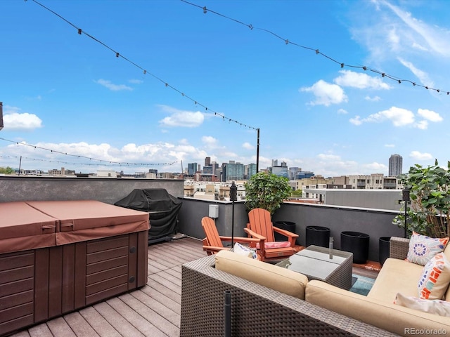 1880 W 32nd Ave, Denver, CO 80211 - deck featuring a hot tub, an outdoor living space, a skyline view, and a grill