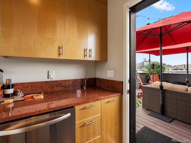 1880 W 32nd Ave, Denver, CO 80211 - kitchen with dishwasher, dark stone counters, and light brown cabinets