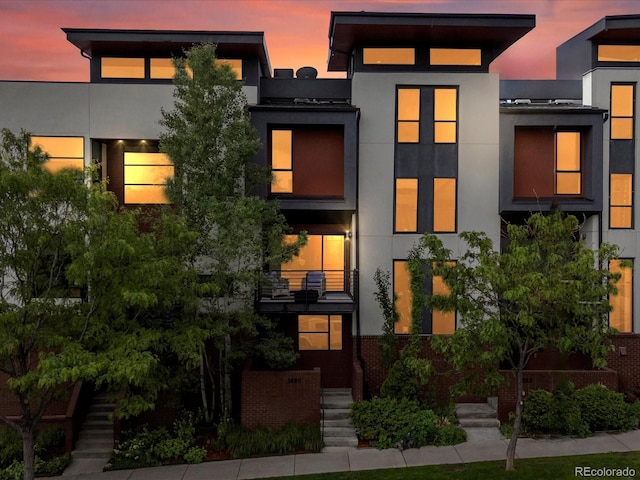 1880 W 32nd Ave, Denver, CO 80211 - contemporary home with stucco siding and stairway
