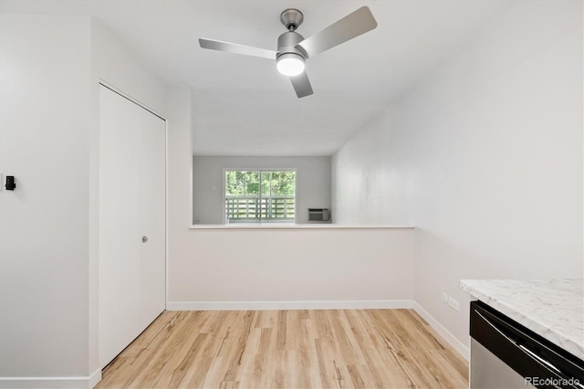 660 S Alton Way Unit 12C, Denver, CO 80247 - unfurnished bedroom featuring light wood-style flooring, a closet, and a ceiling fan