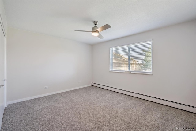 660 S Alton Way Unit 12C, Denver, CO 80247 - carpeted spare room featuring a baseboard radiator and a ceiling fan