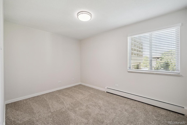 660 S Alton Way Unit 12C, Denver, CO 80247 - carpeted empty room with a baseboard radiator and baseboards