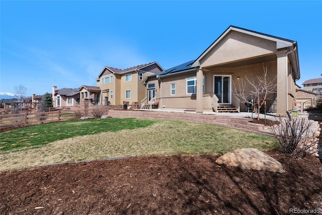 6203 Adamants Dr, Colorado Springs, CO 80924 - back of property featuring entry steps, a residential view, stucco siding, and fence