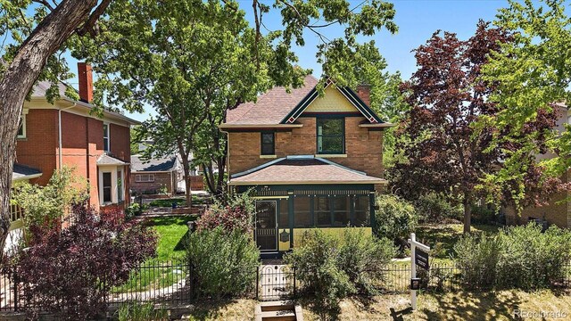 3764 Newton St, Denver, CO 80211 - view of front of property featuring roof with shingles and a chimney