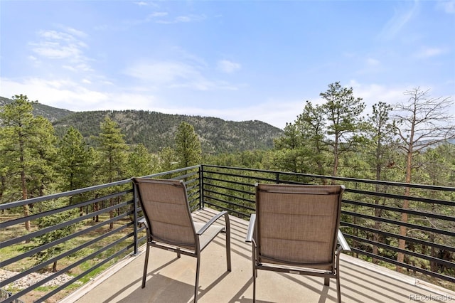 729 Sawmill Rd, Loveland, CO 80537 - balcony with a mountain view and a view of trees