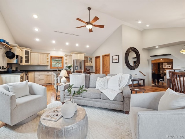 27905 Mariposa Rd, Evergreen, CO 80439 - living room with a ceiling fan, high vaulted ceiling, recessed lighting, and light wood-style flooring