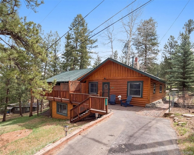 27905 Mariposa Rd, Evergreen, CO 80439 - rustic home with log veneer siding