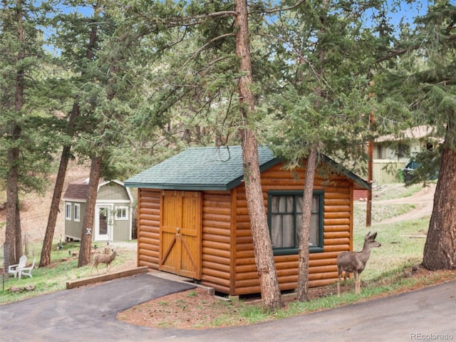 27905 Mariposa Rd, Evergreen, CO 80439 - view of outbuilding with an outbuilding