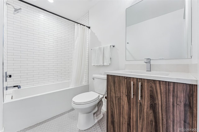 full bathroom with shower / tub combo with curtain, vanity, and toilet