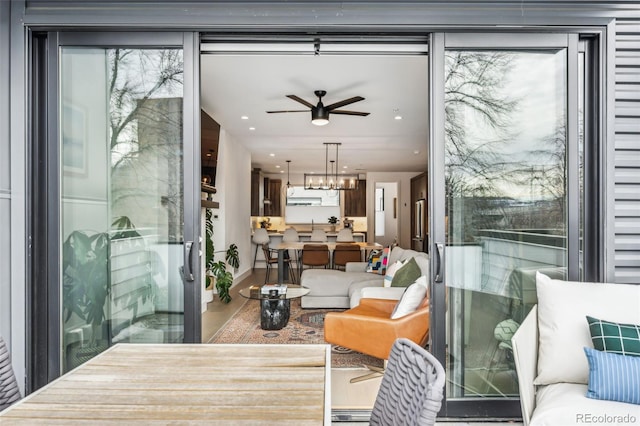 interior space featuring ceiling fan and hardwood / wood-style floors