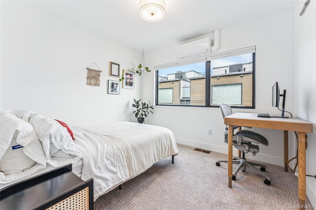 carpeted bedroom featuring a wall mounted air conditioner