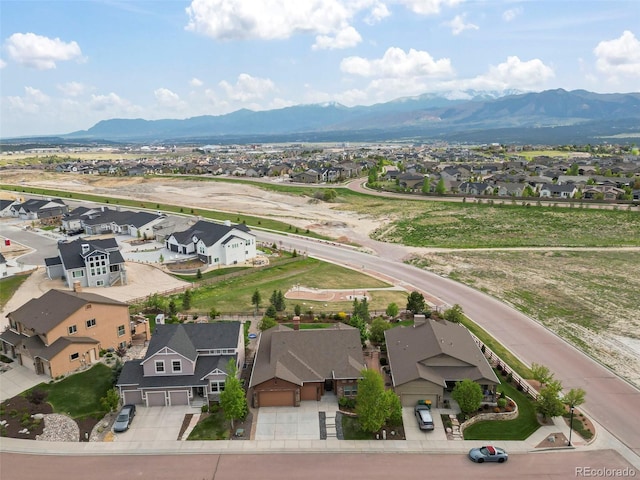 2423 Delicato Ct, Colorado Springs, CO 80921 - aerial perspective of suburban area featuring a mountain backdrop