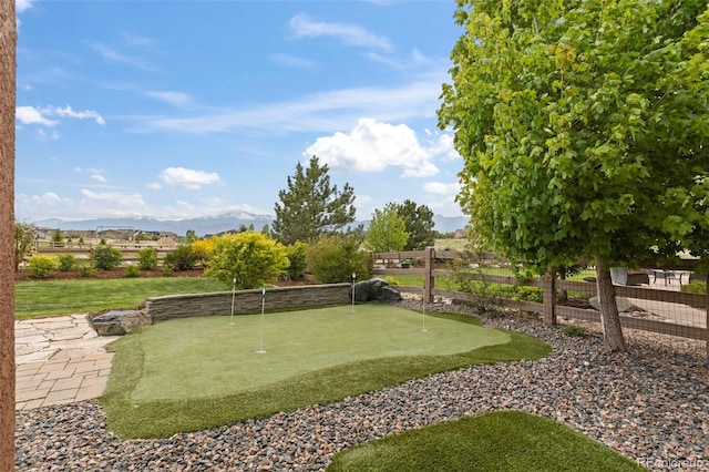2423 Delicato Ct, Colorado Springs, CO 80921 - view of yard with a putting green and a mountain view