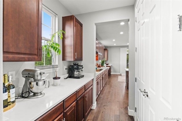 5984 S Paris Pl, Greenwood Village, CO 80111 - kitchen featuring recessed lighting, light countertops, dark wood-style floors, and plenty of natural light