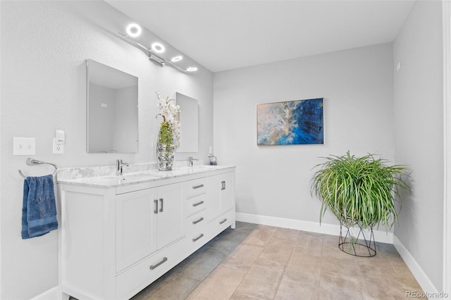 5984 S Paris Pl, Greenwood Village, CO 80111 - full bath featuring double vanity and baseboards