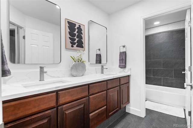 5984 S Paris Pl, Greenwood Village, CO 80111 - full bath with double vanity, tile patterned flooring, and shower / bath combination