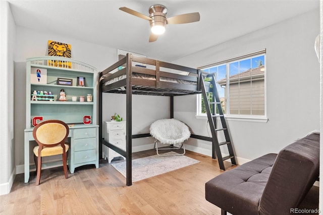 5984 S Paris Pl, Greenwood Village, CO 80111 - bedroom with light wood-style flooring and ceiling fan