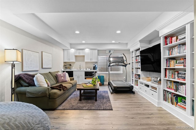 5984 S Paris Pl, Greenwood Village, CO 80111 - living area with light wood-style floors and recessed lighting