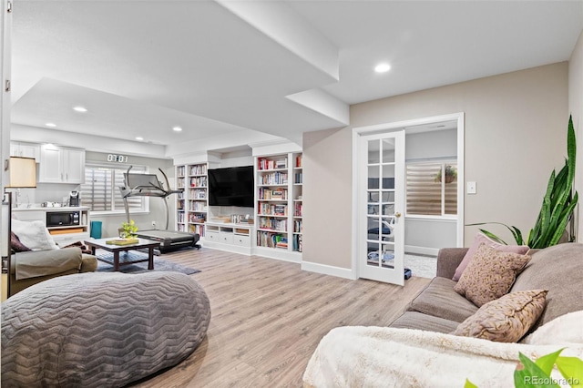 5984 S Paris Pl, Greenwood Village, CO 80111 - living room featuring light wood-style flooring and recessed lighting