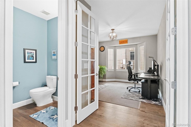5984 S Paris Pl, Greenwood Village, CO 80111 - office with french doors, wood finished floors, and a chandelier